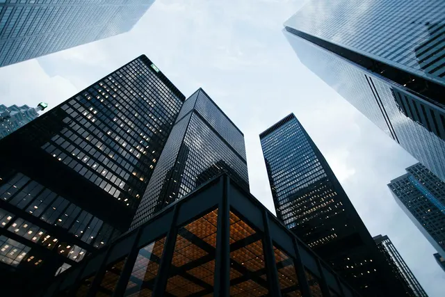 low angle photo of city high rise buildings during daytime